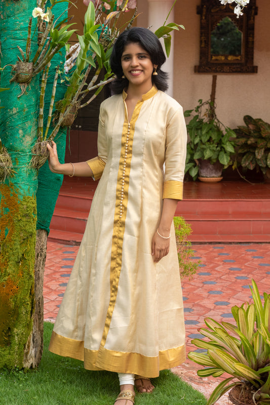 Kasavu Panelled Anarkali With Gold Borders & Potli Buttons